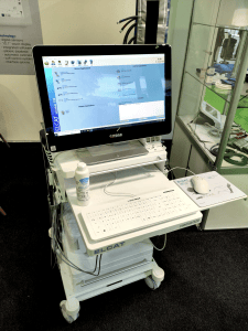 A Man & Machine washable Very Cool Flat keyboard with German key layout and a washable C Mouse are seen on a medical cart A Man & Machine washable Very Cool Flat keyboard with German key layout and a washable C Mouse are seen on a medical cart