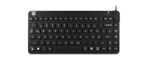A black Man & Machine Slim Cool compact silicone keyboard with German layout is seen from the top