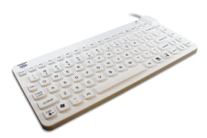 A white Man & Machine Slim Cool compact silicone keyboard with US International layout is seen from the front left