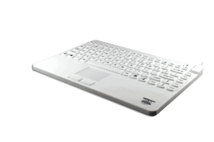 A white Man & Machine Slim Cool Plus silicone laptop style keyboard with US International key layout is seen from the front right