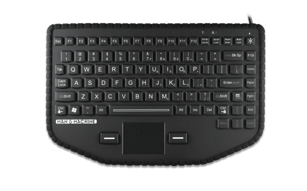A black Man & Machine in-vehicle So Cool keyboard with US International layout is seen from the top